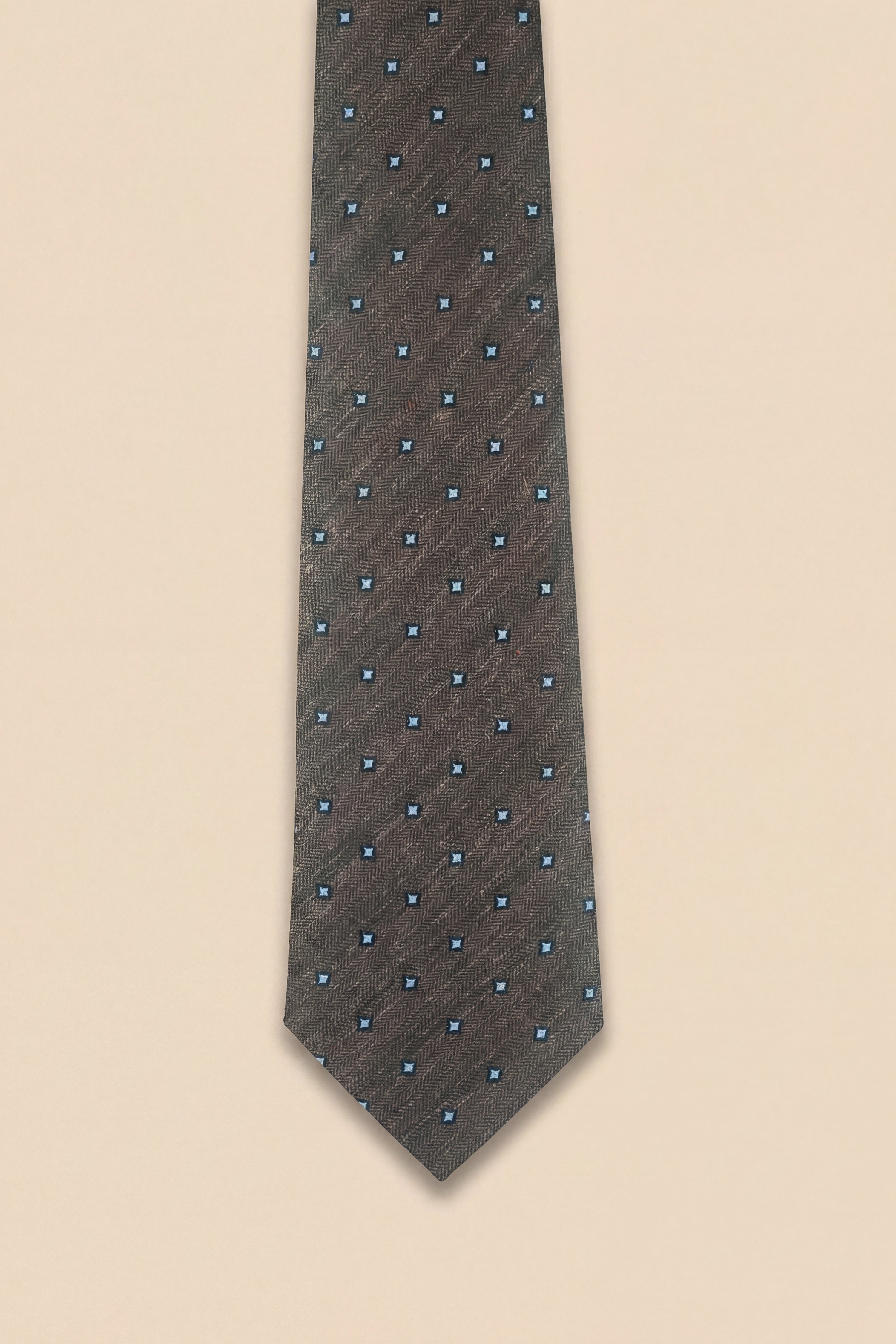 Apollo Fashions Urbanwear brown silk tie with light blue and navy daisy pattern